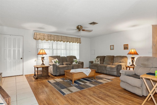 1366 N Merlin Ter, Crystal River, FL 34429 - living area with wood finished floors, visible vents, and a ceiling fan