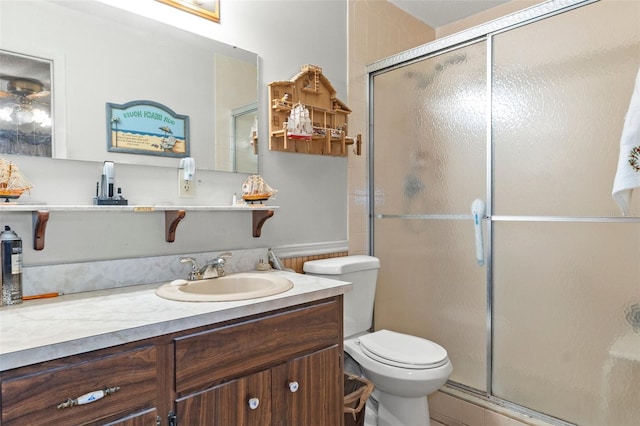 1366 N Merlin Ter, Crystal River, FL 34429 - bathroom featuring toilet, a stall shower, and vanity