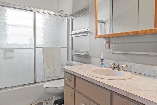 1366 N Merlin Ter, Crystal River, FL 34429 - full bathroom featuring combined bath / shower with glass door, toilet, and vanity