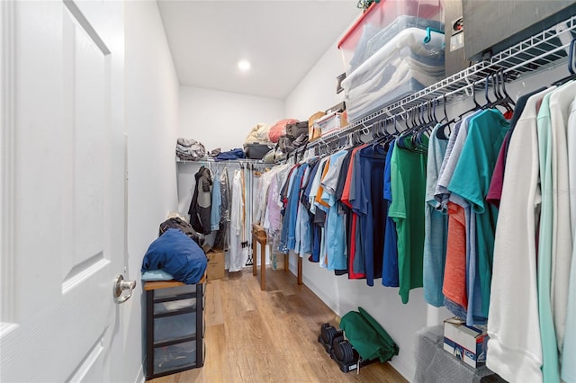 spacious closet with wood finished floors