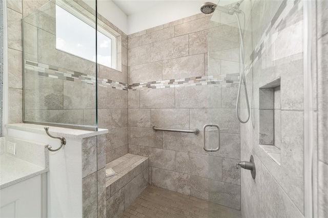 bathroom featuring a shower stall
