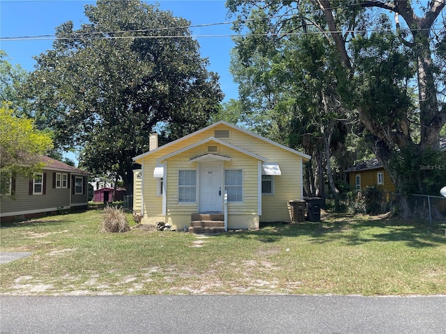 621 NE 20th St, Ocala, FL 34470 - view of front of house featuring a chimney