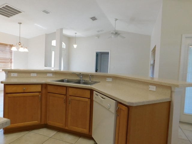 kitchen with visible vents, light tile patterned floors, a sink, and white dishwasher