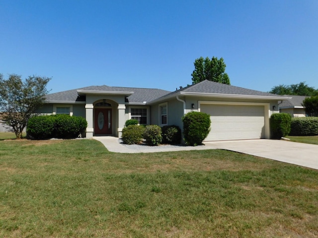 ranch-style house with driveway, a front lawn, stucco siding, and an attached garage