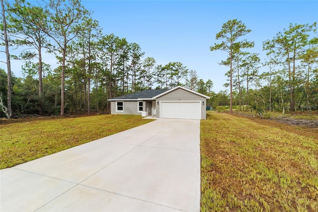 ranch-style house with a front yard, stucco siding, driveway, and an attached garage
