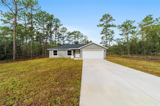 single story home with concrete driveway, a front yard, an attached garage, and stucco siding