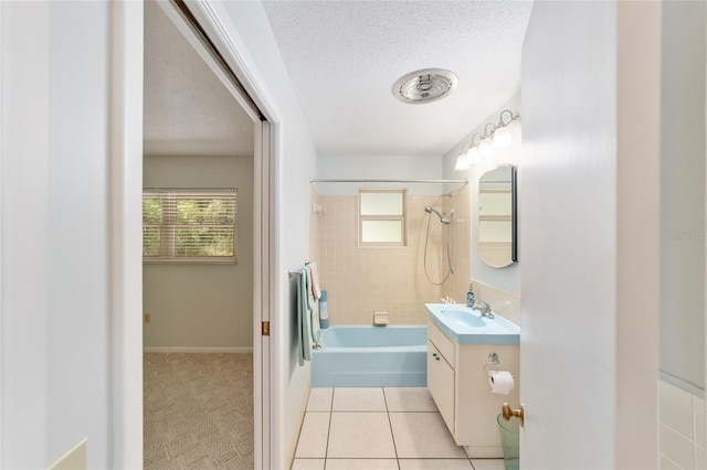 1179 SE 170th Ct, Silver Springs, FL 34488 - full bathroom with vanity, shower / bath combination, tile patterned floors, and a textured ceiling