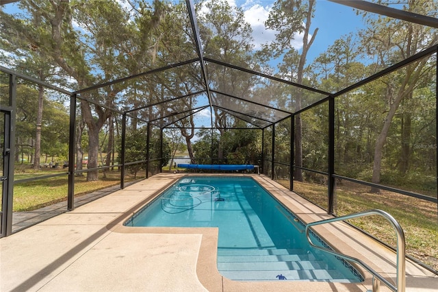 1179 SE 170th Ct, Silver Springs, FL 34488 - outdoor pool with a patio area, a lanai, view of scattered trees, and a lawn