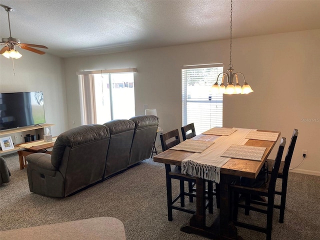 15266 SW 44th Ter, Ocala, FL 34473 - dining space with plenty of natural light, a textured ceiling, carpet, and ceiling fan with notable chandelier