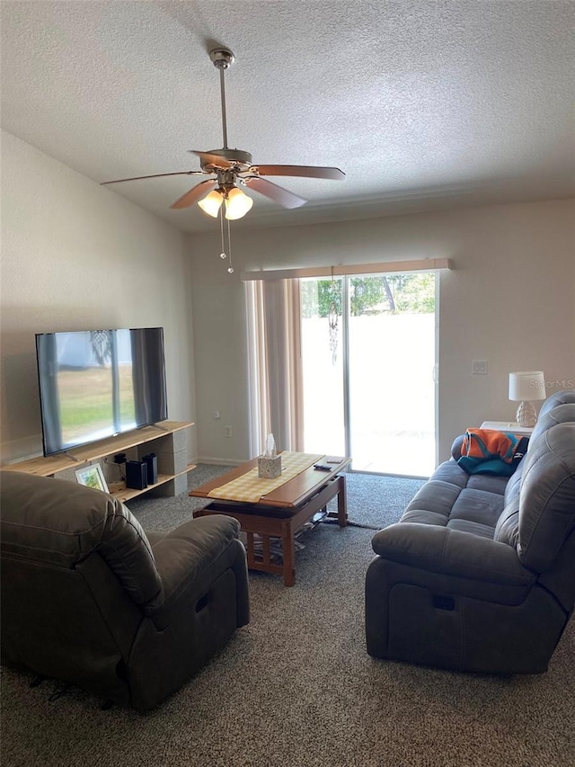 15266 SW 44th Ter, Ocala, FL 34473 - carpeted living room with a textured ceiling and ceiling fan