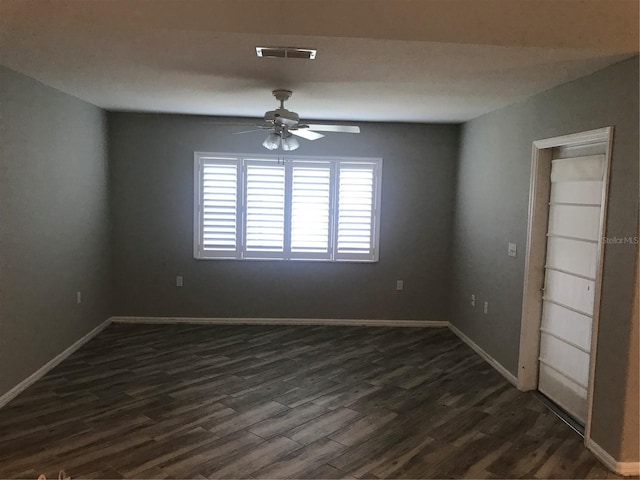 11411 SW 138th Ln, Dunnellon, FL 34432 - empty room with baseboards, ceiling fan, dark wood-style floors, and visible vents