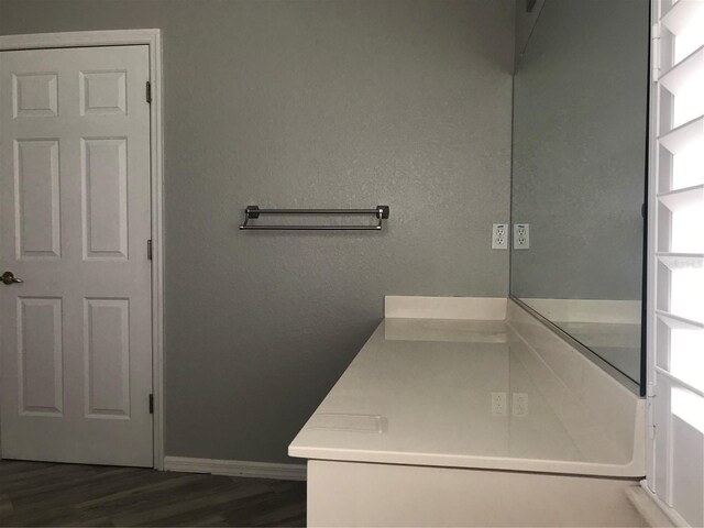 11411 SW 138th Ln, Dunnellon, FL 34432 - bathroom with baseboards and wood finished floors
