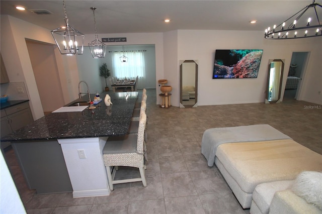 7429 SW 61st St, Ocala, FL 34474 - dining space with a chandelier, light tile patterned floors, and recessed lighting