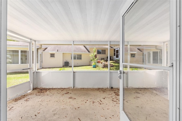 unfurnished sunroom with plenty of natural light