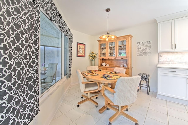 7102 Silvermill Dr, Tampa, FL 33635 - dining area with light tile patterned floors