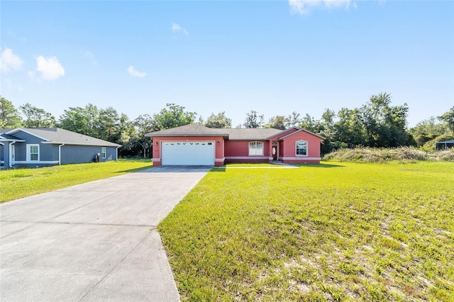 15087 SW 43rd Ct, Ocala, FL 34473 - ranch-style house with an attached garage, driveway, and a front yard