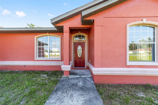 15087 SW 43rd Ct, Ocala, FL 34473 - view of exterior entry with stucco siding