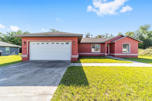 15087 SW 43rd Ct, Ocala, FL 34473 - ranch-style home featuring driveway, a front yard, an attached garage, and stucco siding