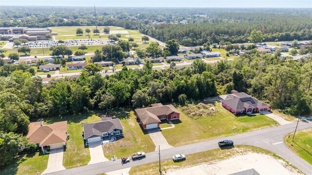 15087 SW 43rd Ct, Ocala, FL 34473 - aerial view of residential area with a forest