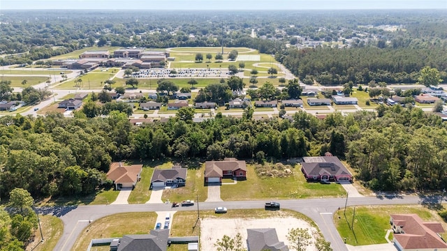15087 SW 43rd Ct, Ocala, FL 34473 - aerial view of property's location with nearby suburban area and a heavily wooded area