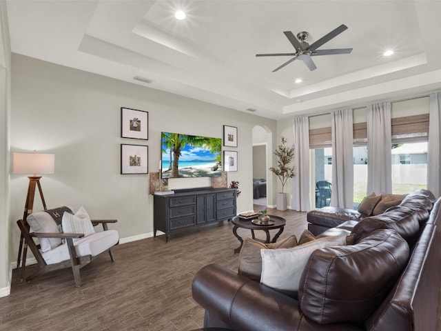 4806 NW 8th Ter, Ocala, FL 34475 - living area featuring arched walkways, recessed lighting, a ceiling fan, baseboards, and a tray ceiling