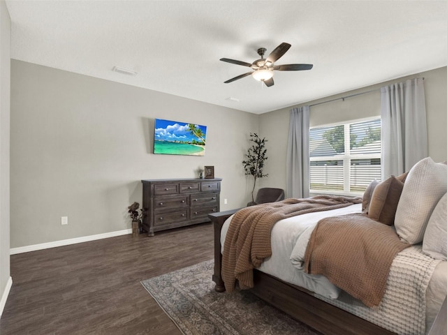 4806 NW 8th Ter, Ocala, FL 34475 - bedroom featuring baseboards, a ceiling fan, and dark wood-style floors