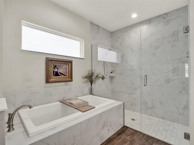 4806 NW 8th Ter, Ocala, FL 34475 - full bathroom featuring a shower stall, recessed lighting, and a bath
