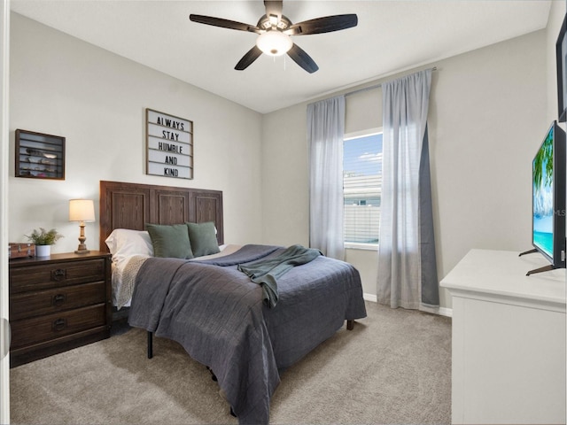 4806 NW 8th Ter, Ocala, FL 34475 - bedroom featuring ceiling fan, light carpet, and baseboards