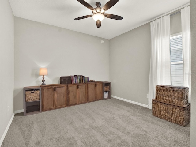 4806 NW 8th Ter, Ocala, FL 34475 - interior space with light colored carpet, a ceiling fan, and baseboards