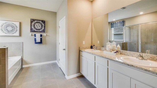 2026 NW 136th Blvd, Newberry, FL 32669 - full bathroom with a shower stall, baseboards, and a sink