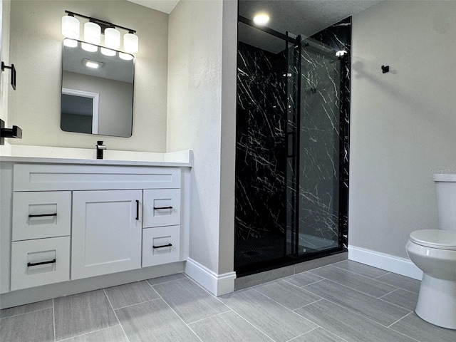 full bath with vanity, toilet, a marble finish shower, baseboards, and wood tiled floor