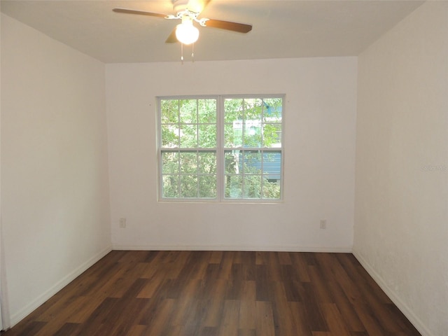 219 SE 3rd Ave, Williston, FL 32696 - spare room featuring ceiling fan, wood finished floors, and baseboards