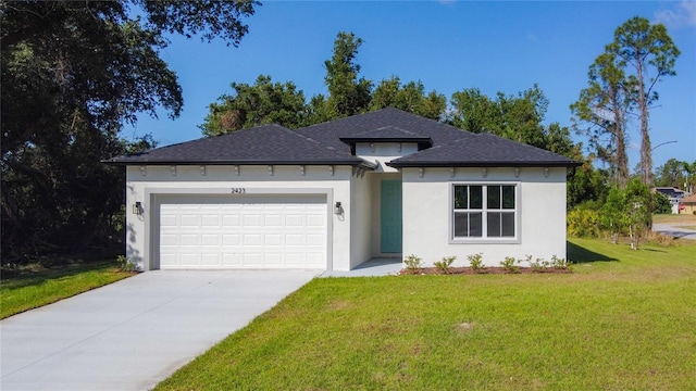 2423 Sadnet Ln, North Port, FL 34286 - view of front of home with concrete driveway, a front lawn, an attached garage, and stucco siding