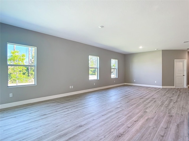 2423 Sadnet Ln, North Port, FL 34286 - spare room with baseboards, recessed lighting, visible vents, and light wood finished floors