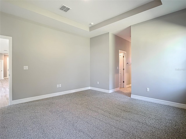 2423 Sadnet Ln, North Port, FL 34286 - unfurnished room with baseboards, visible vents, and a raised ceiling