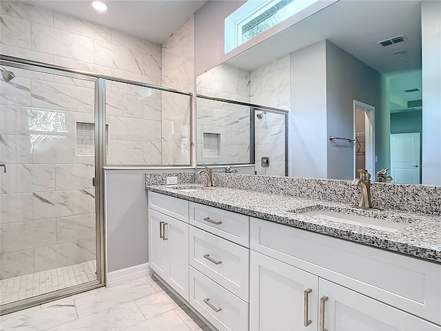 2423 Sadnet Ln, North Port, FL 34286 - full bath with a stall shower, marble finish floor, a sink, and visible vents