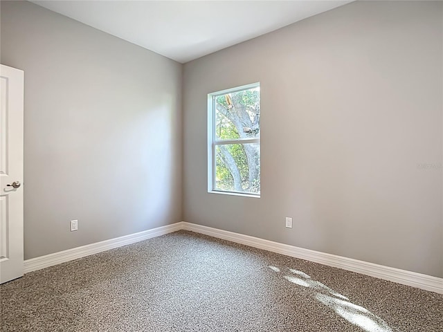 2423 Sadnet Ln, North Port, FL 34286 - empty room with speckled floor and baseboards