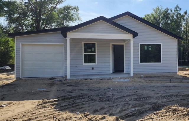 1610 SW 152nd Ct, Ocala, FL 34481 - view of front of property with a porch