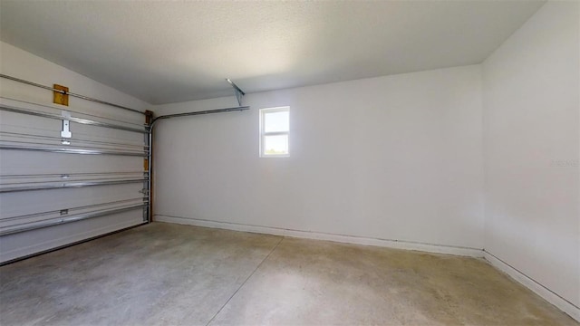 1610 SW 152nd Ct, Ocala, FL 34481 - garage featuring baseboards