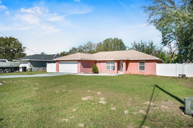 13425 SW 106th Pl, Dunnellon, FL 34432 - ranch-style house with concrete driveway, an attached garage, fence, and a front yard