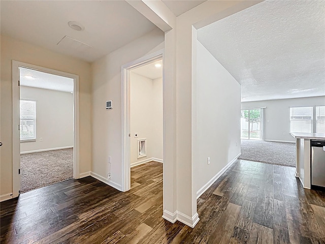 19 Roxland Ln, Palm Coast, FL 32164 - hallway with baseboards and dark wood-type flooring
