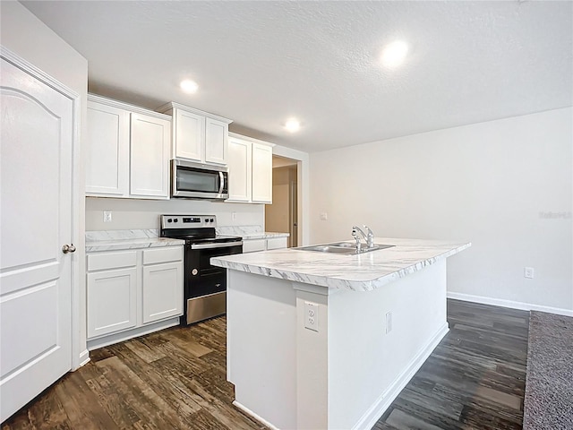 19 Roxland Ln, Palm Coast, FL 32164 - kitchen with light countertops, a sink, dark wood-style flooring, and stainless steel appliances