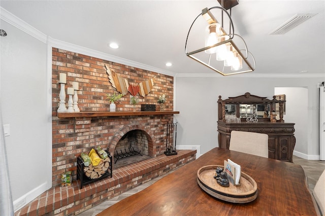 dining area with a fireplace, recessed lighting, baseboards, visible vents, and ornamental molding