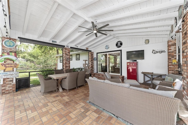 view of patio featuring outdoor lounge area, a ceiling fan, and outdoor dining area