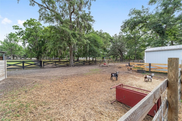 exterior space with fence and an enclosed area