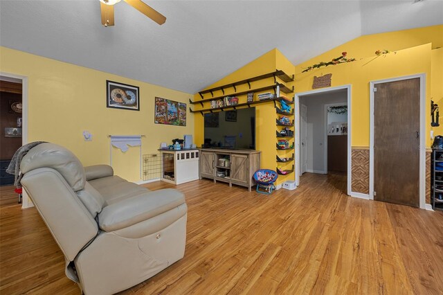 408 Etheredge St, Bushnell, FL 33513 - living area with vaulted ceiling, wood finished floors, and a ceiling fan