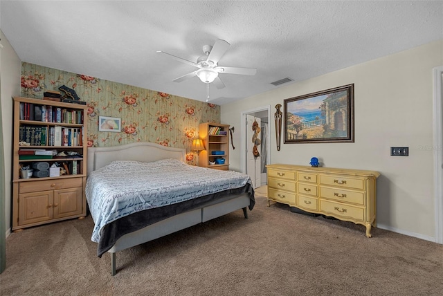 408 Etheredge St, Bushnell, FL 33513 - bedroom with wallpapered walls, carpet, ceiling fan, a textured ceiling, and a closet