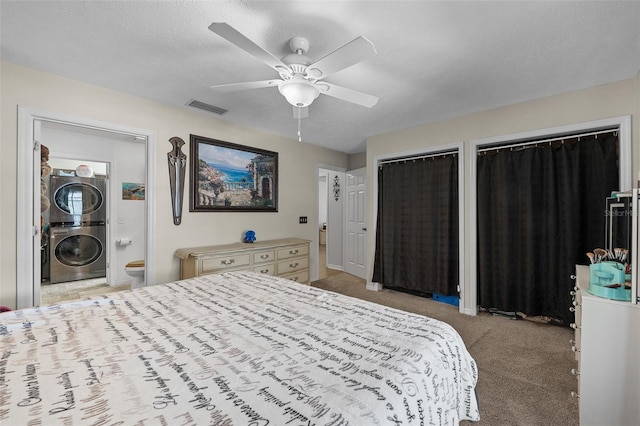 408 Etheredge St, Bushnell, FL 33513 - carpeted bedroom featuring stacked washer / drying machine, multiple closets, ensuite bath, and a ceiling fan