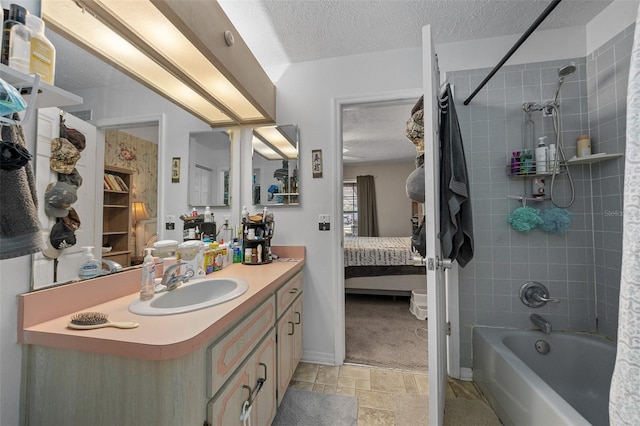 408 Etheredge St, Bushnell, FL 33513 - full bathroom featuring ensuite bathroom, bathing tub / shower combination, vanity, a textured ceiling, and stone finish flooring