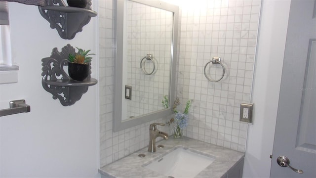 9880 SW 101st Pl, Ocala, FL 34481 - bathroom with a sink and decorative backsplash